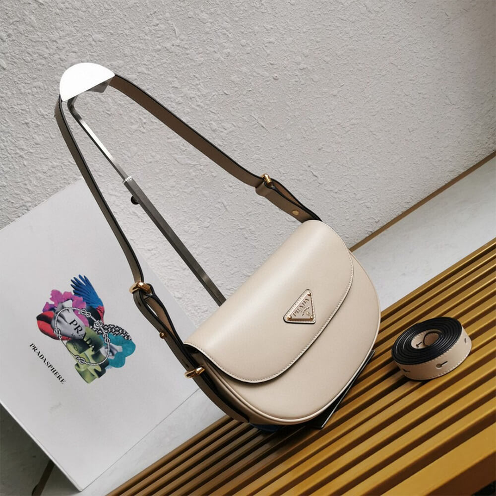 Pra*a Arque leather shoulder bag with flap